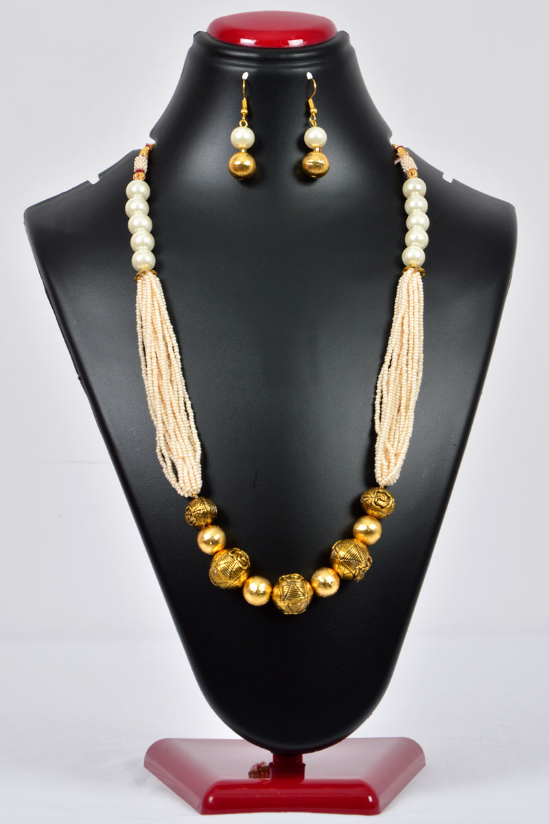 White Color Pearl Neckpiece emblished with Gold Plated Work and Multiple Beaded Chains and with a pair of Dangle Earrings - MCJ250116